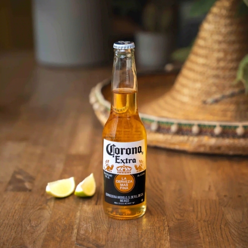 bottle of Corona with lime wedges